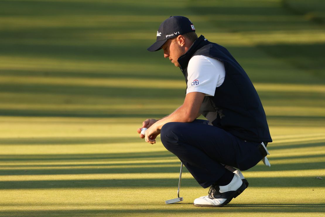Thomas lines up a putt during the third round of the 120th U.S. Open.