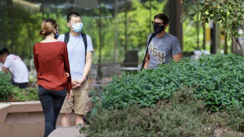 Students are required to wear masks on campus, even outside buildings. 