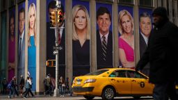 NEW YORK, NY - MARCH 13: Advertisements featuring Fox News personalities, including Tucker Carlson, adorn the front of the News Corporation building, March 13, 2019 in New York City. On Wednesday the network's sales executives are hosting an event for advertisers to promote Fox News. Fox News personalities Tucker Carlson and Jeanine Pirro have come under criticism in recent weeks for controversial comments and multiple advertisers have pulled away from their shows. (Photo by Drew Angerer/Getty Images)