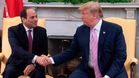 President Donald Trump shakes hands during a meeting with Egyptian President Abdel Fattah el-Sisi in the Oval Office at the White House in Washington, DC, on April 9, 2019. 