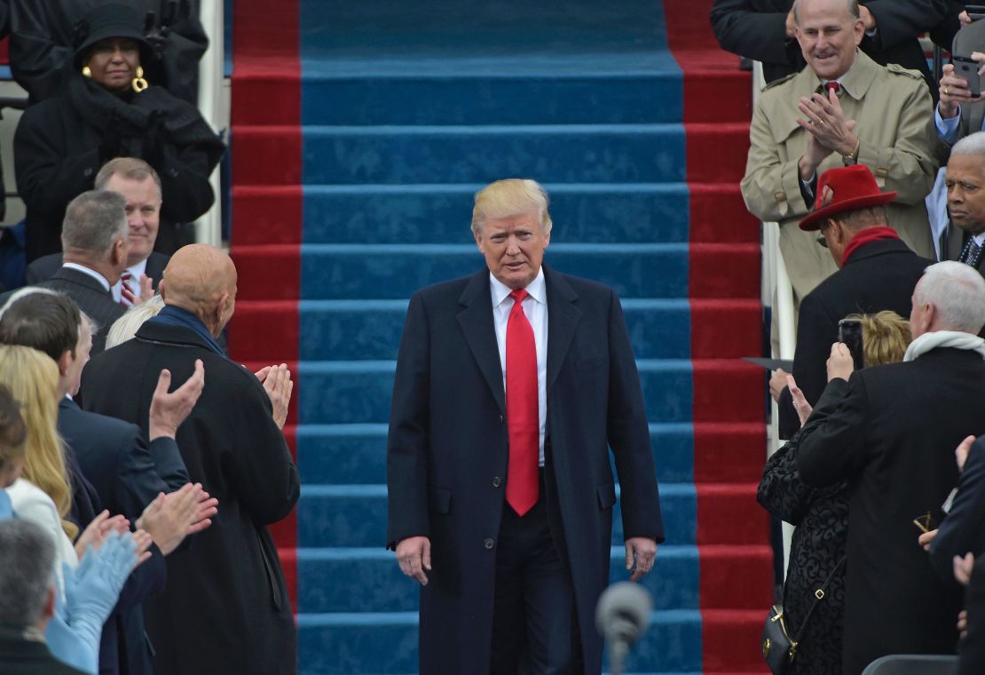 Donald Trump arrives on the platform at the US Capitol for his swearing-in ceremony on January 20, 2017.