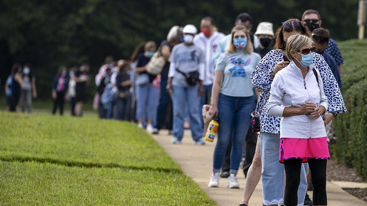 People stand in line to vote on September 18, 2020, in Fairfax, Virginia. 
