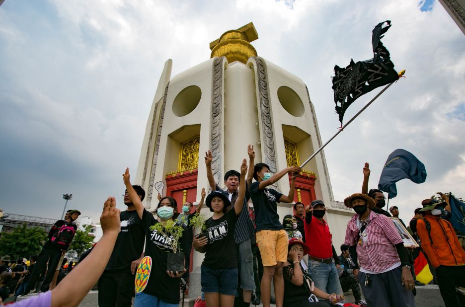Protesters occupy the historic Democracy monument in Bangkok on October 14. Thousands of anti-government protestors rallied near Government House on the anniversary of a 1973 popular uprising that led to the ousting of a military dictatorship.