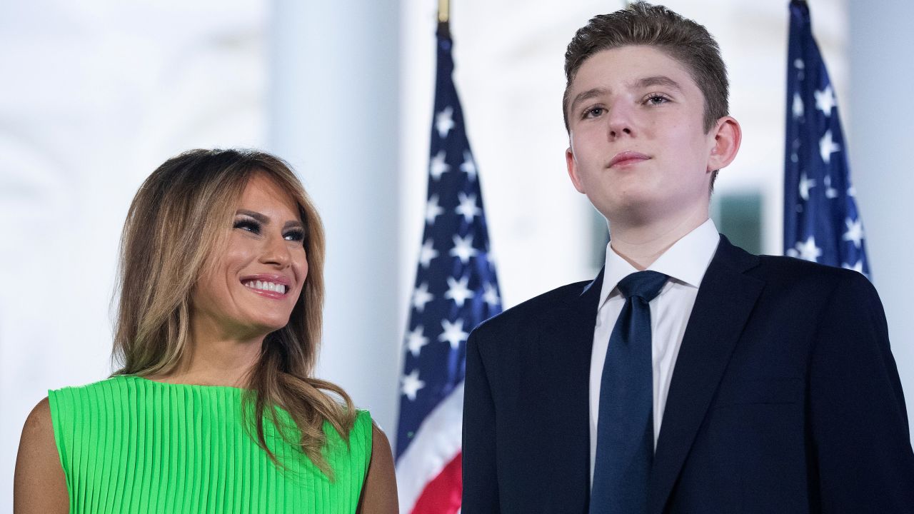 WASHINGTON, DC - AUGUST 27:  First lady Melania Trump (L) looks at her son Barron Trump after U.S. President Donald Trump delivered his acceptance speech for the Republican presidential nomination on the South Lawn of the White House August 27, 2020 in Washington, DC. Trump gave the speech in front of 1500 invited guests. (Photo by Chip Somodevilla/Getty Images)