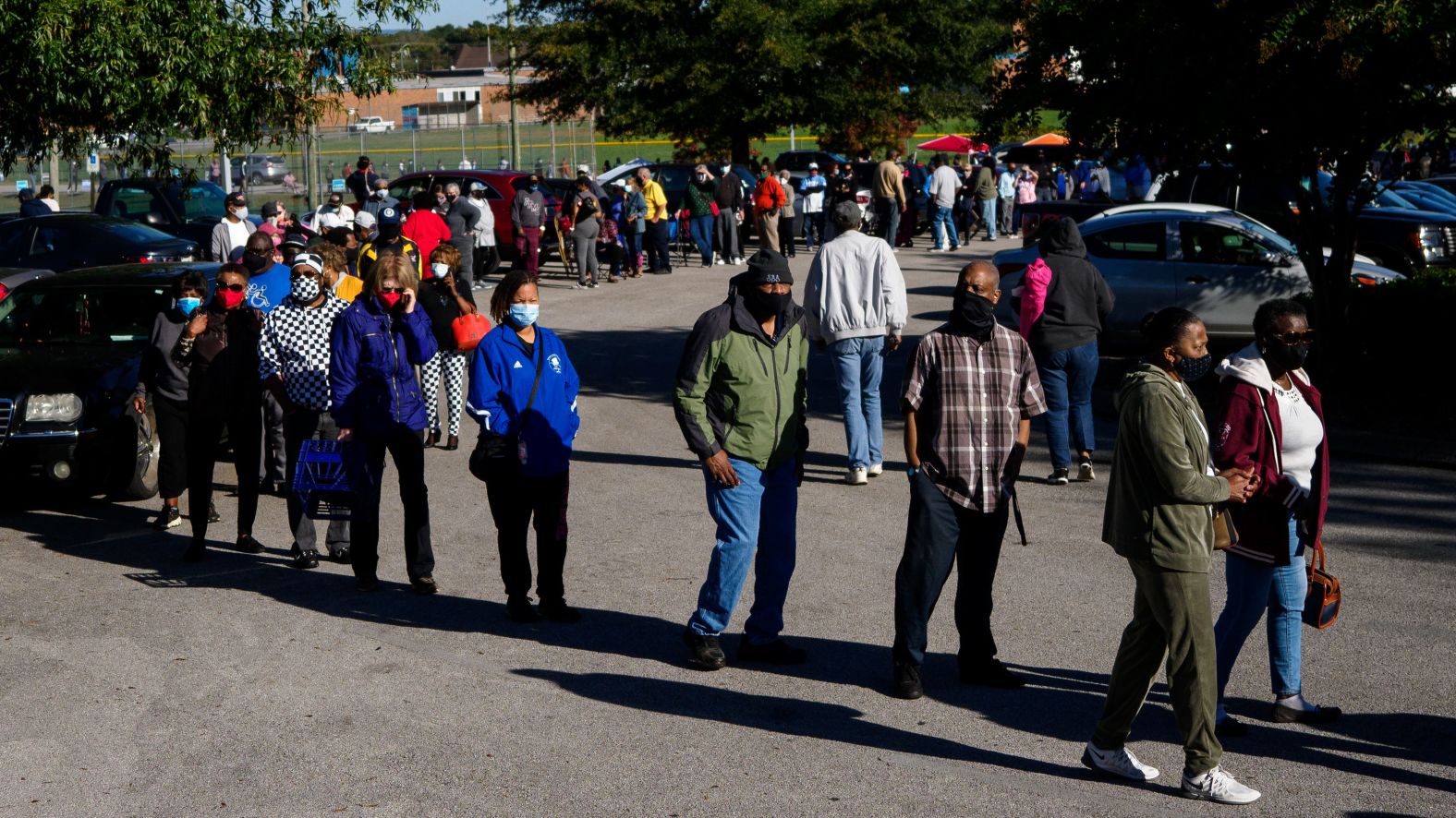 People wait to vote in Chattanooga, Tennessee, on October 14. Early voting had just opened in Tennessee, and some people said they waited 90 minutes to just reach the entrance.