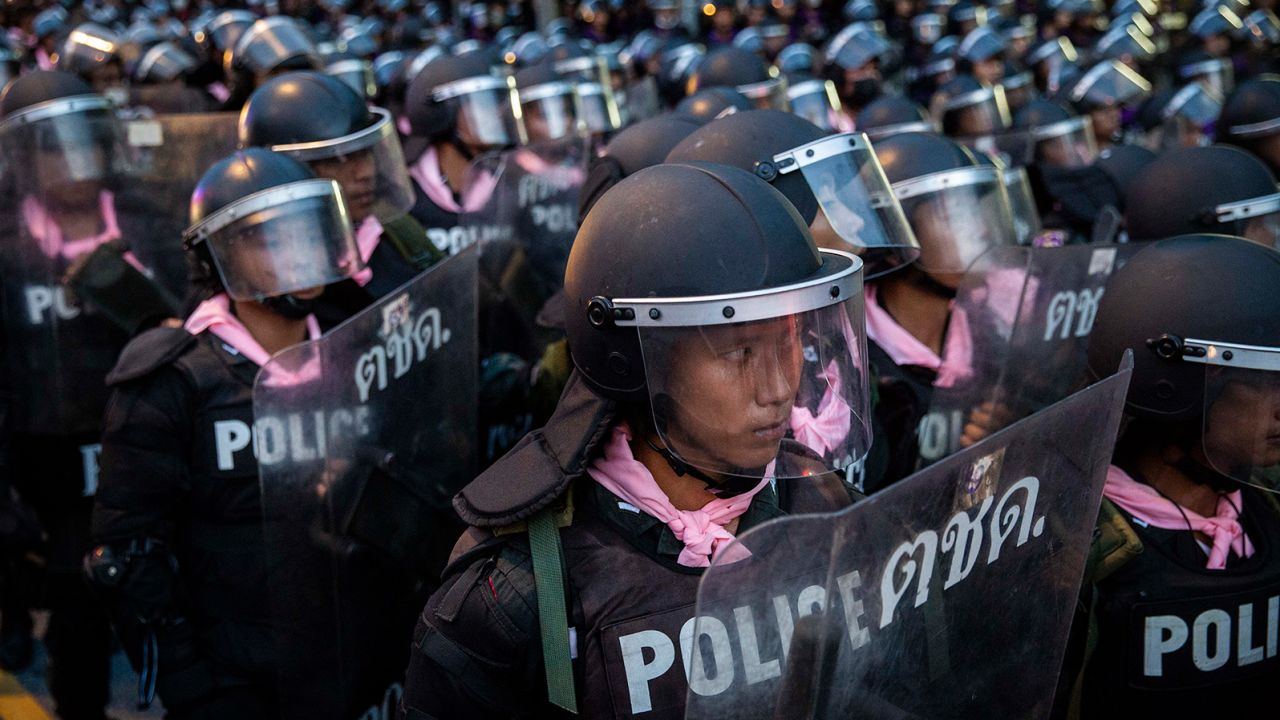 Thai riot police force protesters to retreat away from Government House on October 15, 2020 in Bangkok, Thailand.