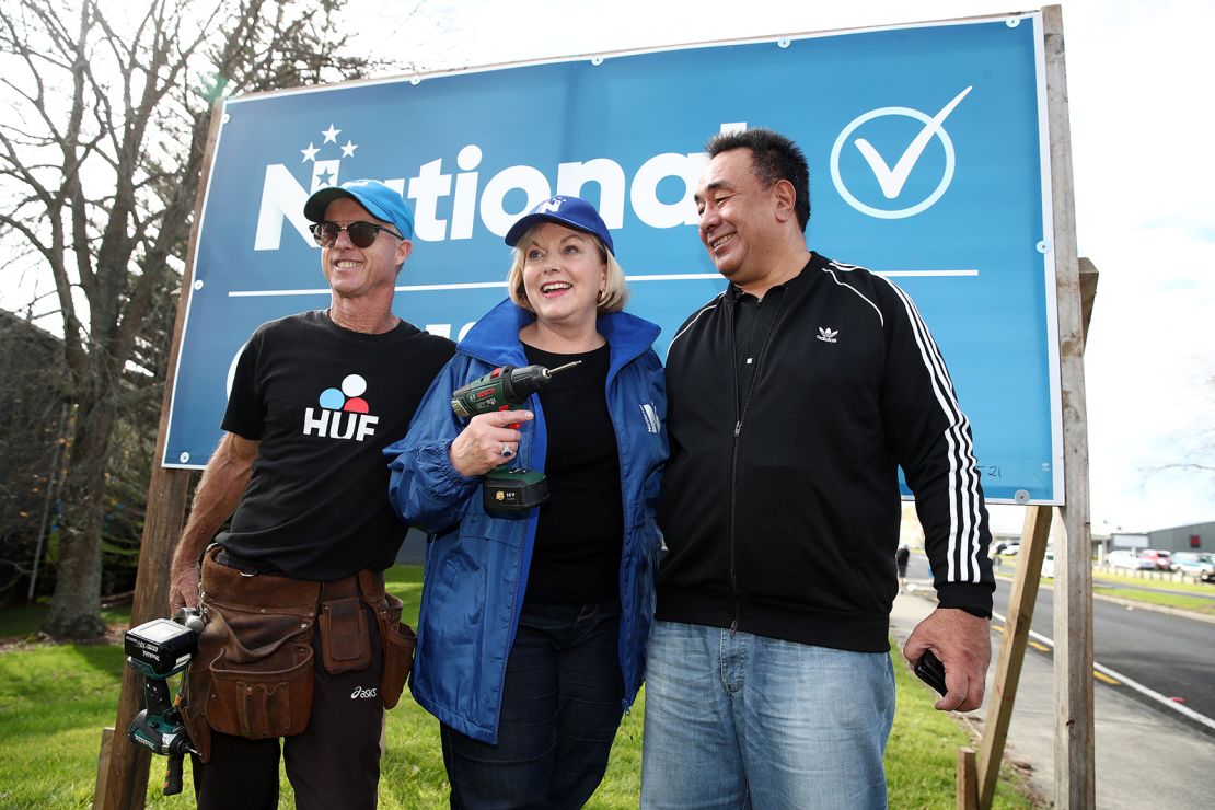 New National Party leader Judith Collins with her husband David Wong-Tung, right, and her tennis coach and sign builder, David Knott, on July 18, 2020, in Auckland, New Zealand. 