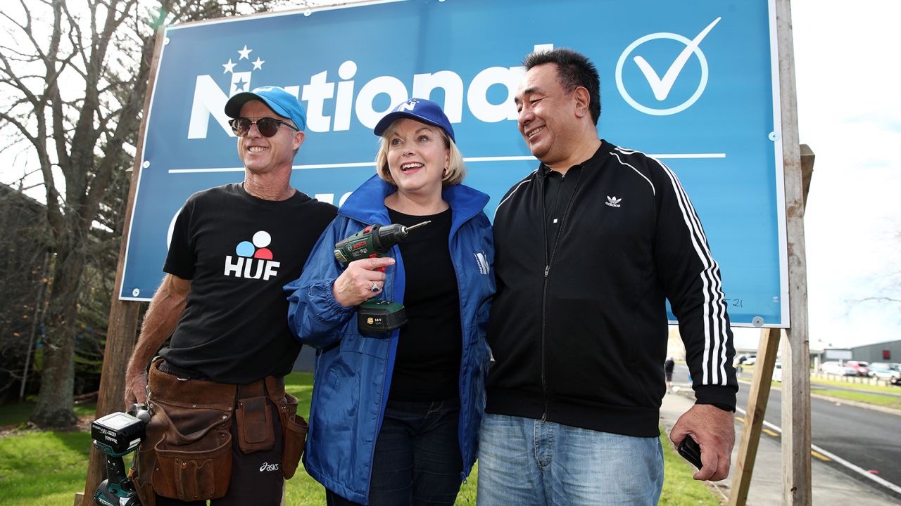 New National Party leader Judith Collins with her husband David Wong-Tung, right, and her tennis coach and sign builder, David Knott, on July 18, 2020, in Auckland, New Zealand.