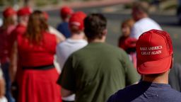 A man wears a MAGA hat as he waits in line to attend the "Great American Comeback Event" campaign rally with US President Donald Trump at Xtreme Manufacturing in Henderson, Nevada on September 13, 2020. (Photo by Bridget BENNETT / AFP) (Photo by BRIDGET BENNETT/AFP via Getty Images)