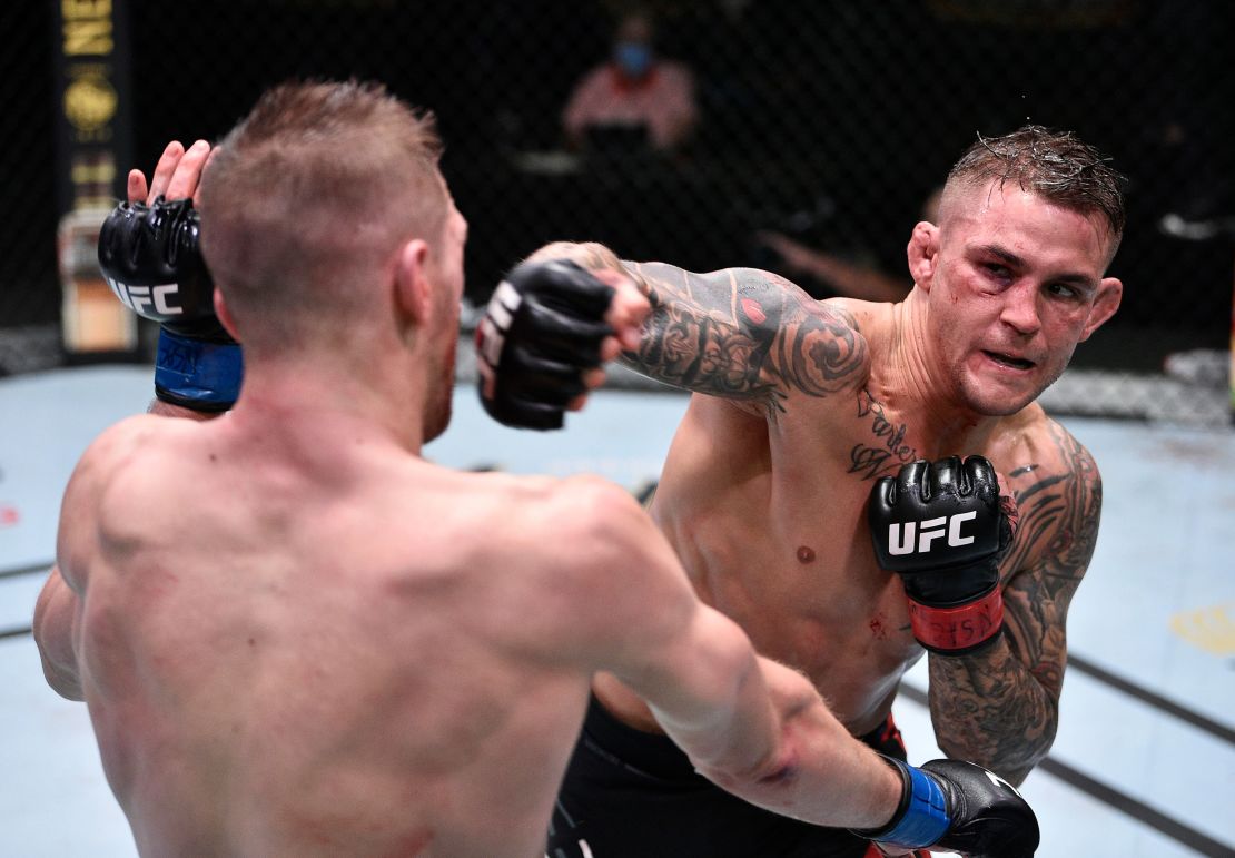 Poirier punches Dan Hooker in their lightweight fight during the UFC Fight Night event.