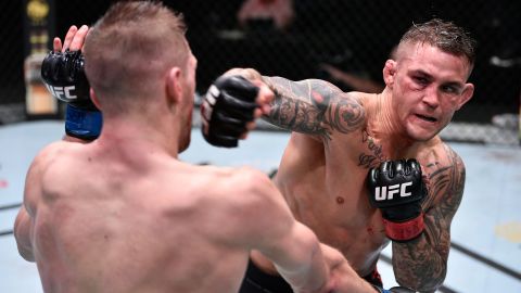 Poirier punches Dan Hooker in their lightweight fight during the UFC Fight Night event.