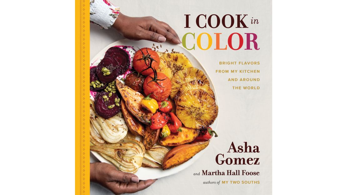 Asha Gomez's second cookbook focuses on colorful ingredients and the power of family.