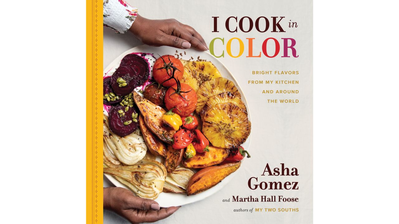 Asha Gomez's second cookbook focuses on colorful ingredients and the power of family.