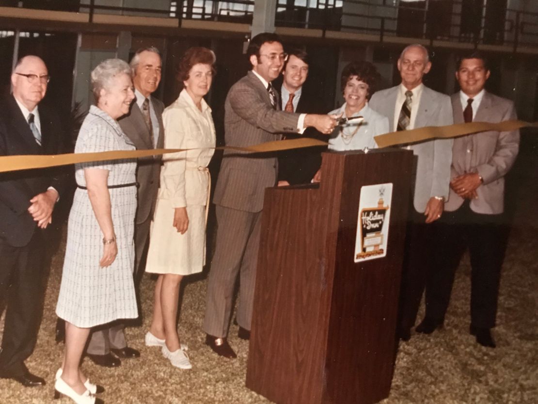 George Falls cut the ribbon for the opening of the holidome at Holiday Inn of North Platte, Nebraska, in 1974. 

