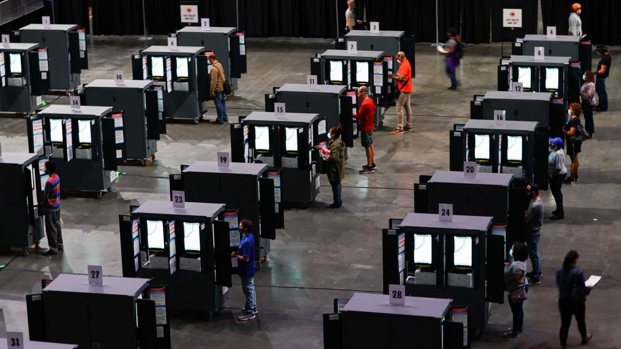 Residents cast ballots at an early-voting polling location in Atlanta on Monday, October 12, 2020.