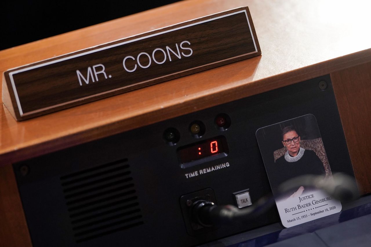 A photo of the late Ruth Bader Ginsburg is seen at the seat of US Sen. Chris Coons, a Democrat from Delaware.
