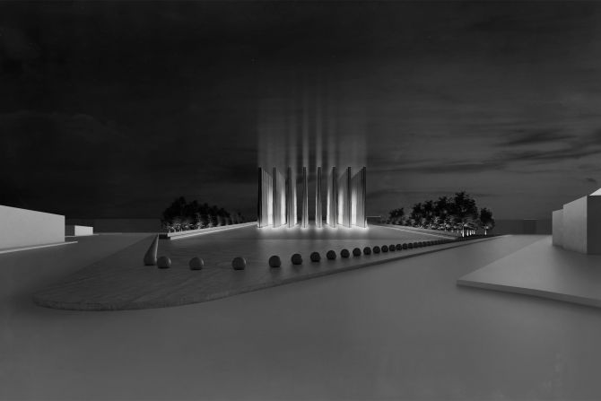<strong>Le Memorial des Martyrs, Niamey, Niger -- </strong>A newly released design from Adjaye Associates finds a solid and somber way to memorialize the lives lost in <a href="index.php?page=&url=https%3A%2F%2Fcnn.com%2F2020%2F08%2F10%2Fafrica%2Fniger-french-aid-workers-attack%2Findex.html" target="_blank">the fight against terrorism</a> on Niger's southern and western borders. "Absences and voids" are at the heart of the space, says Adjaye Associates, with light and darkness in interplay throughout the day and into the night, as the pillars project shafts of light up into the sky.