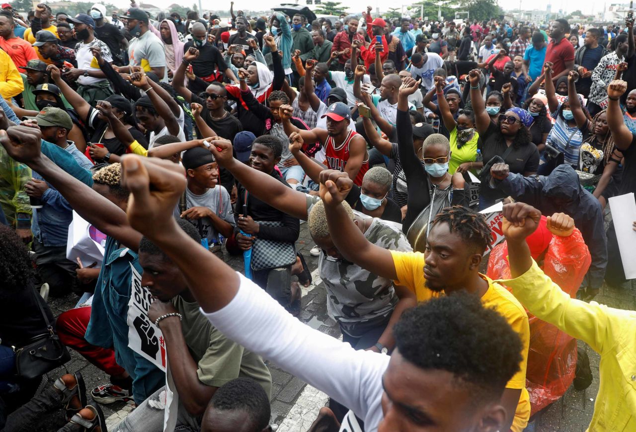 Demonstrators gesture during a protest in Lagos on October 14.