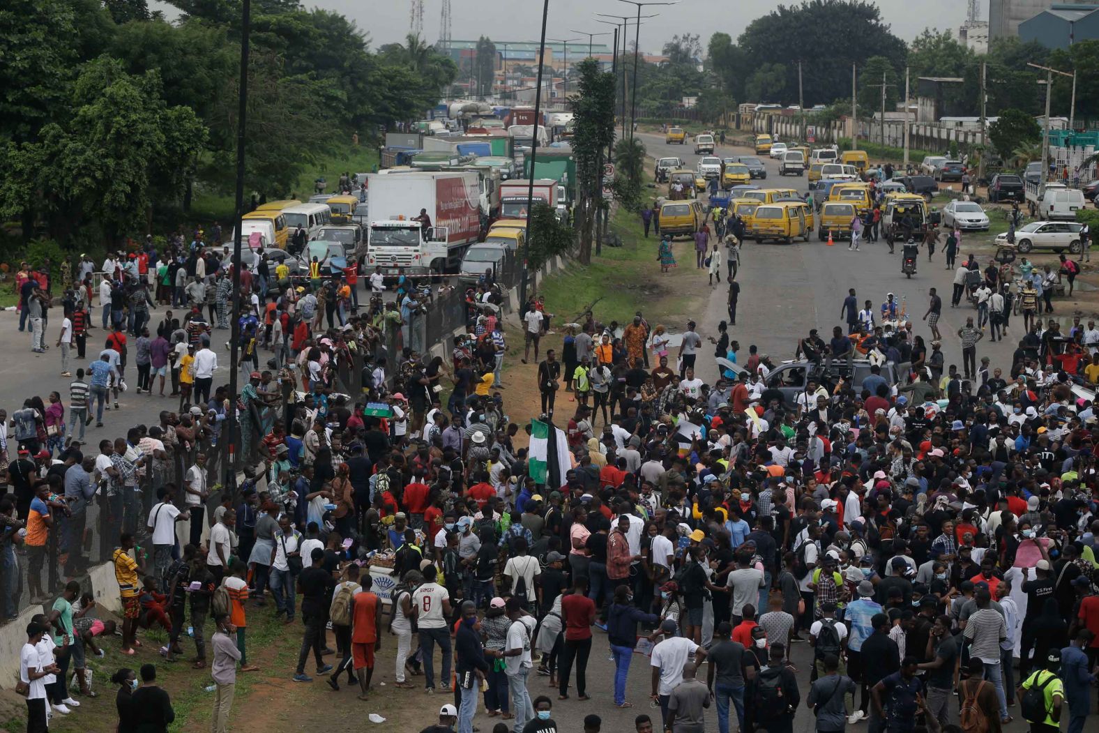 Demonstrators block a major road in Lagos on October 14.