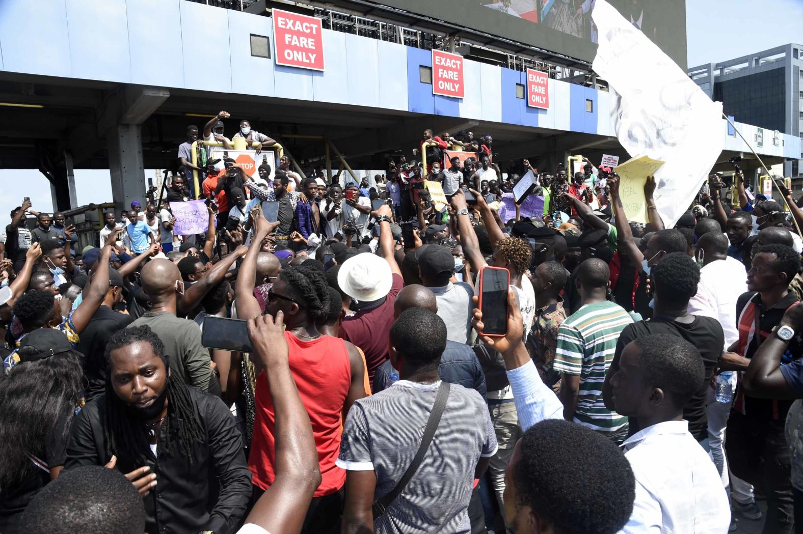 Demonstrators block the Lekki toll plaza in Lagos on October 12.