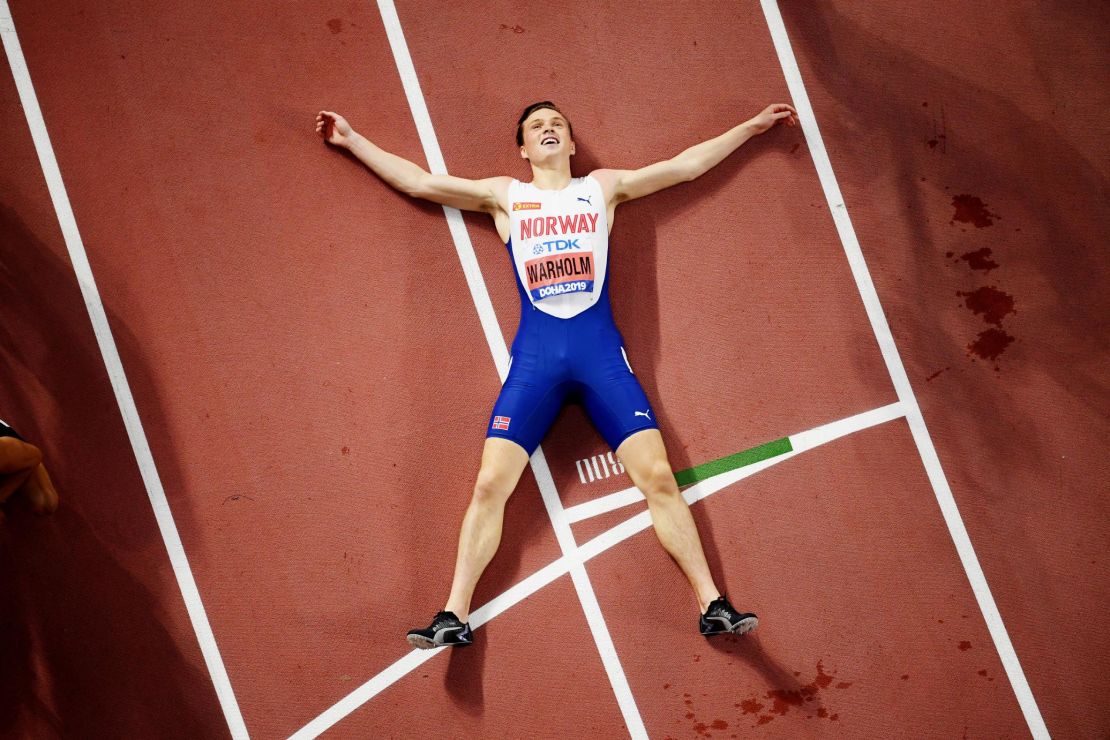 Warholm catches his breath after winning gold at the World Athletics Championships in Doha. 
