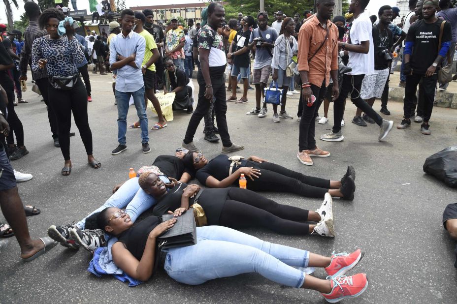Protesters lie on the road along the Lagos-Ibadan Expressway.