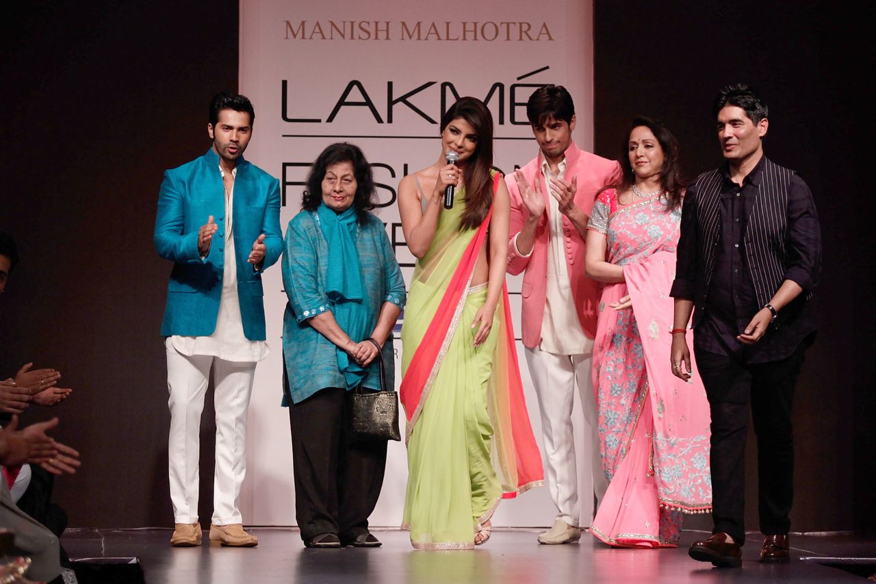Bhanu Athaiya, second from left, on the runway during Mumbai's Lakme Fashion Week in 2013.