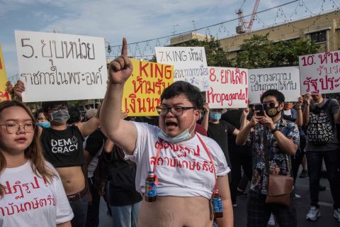 Parit "Penguin" Chiwarak, 22, a student and one of the leaders of the pro-democracy movement, is allowed by police to read a 10-point manifesto on reforming the monarchy.