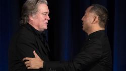Former White House Chief Strategist Steve Bannon (L) greets fugitive Chinese billionaire Guo Wengui before introducing him at a news conference on November 20, 2018 in New York, on the death of of tycoon Wang Jian in France on July 3, 2018. (Photo by Don EMMERT / AFP)        (Photo credit should read DON EMMERT/AFP via Getty Images)