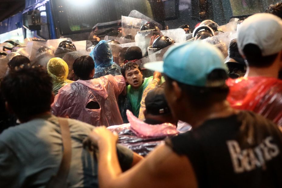 Protesters face off against riot police on October 16.