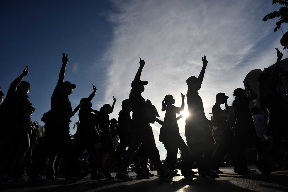 Protesters take part in a fun run during an anti-government rally in front of Democracy Monument in Bangkok on July 26.