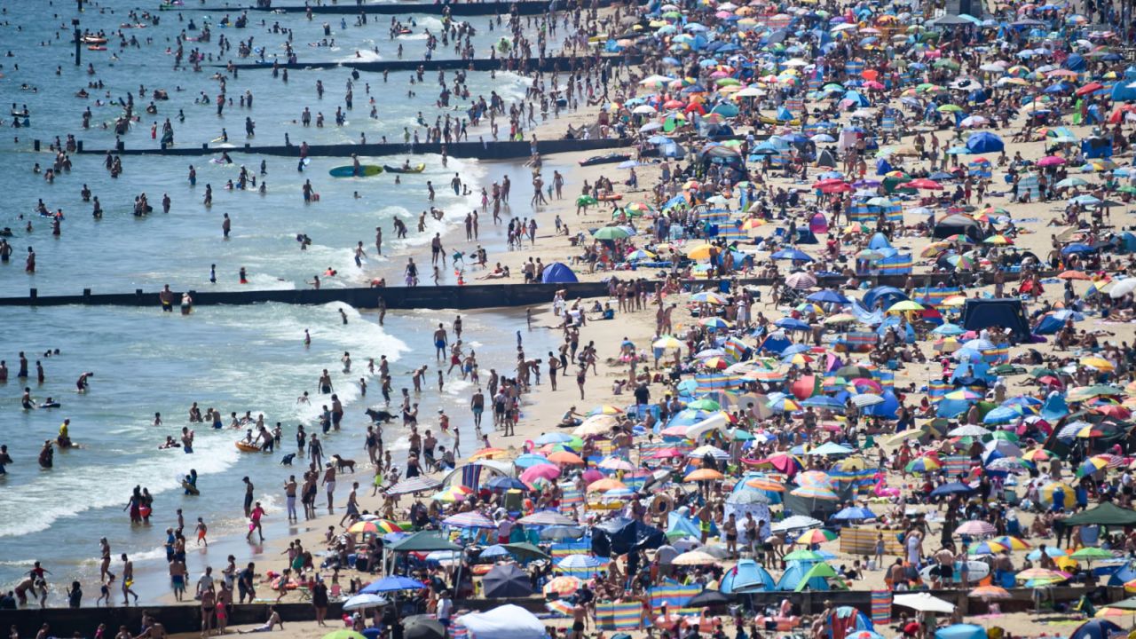 Scenes of crowded beaches over the summer, such as this at Bournemouth, helped stir local UK resentment against visitors.