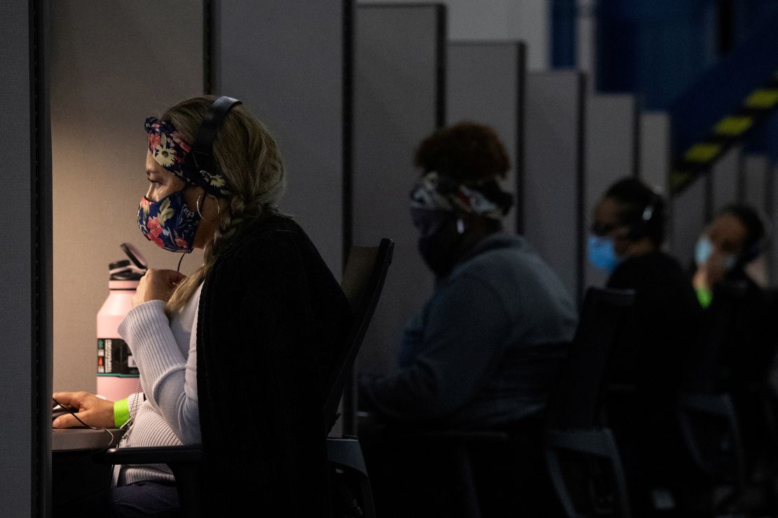 Contact tracers with the Houston Health Department monitor the outbreak on July 22.