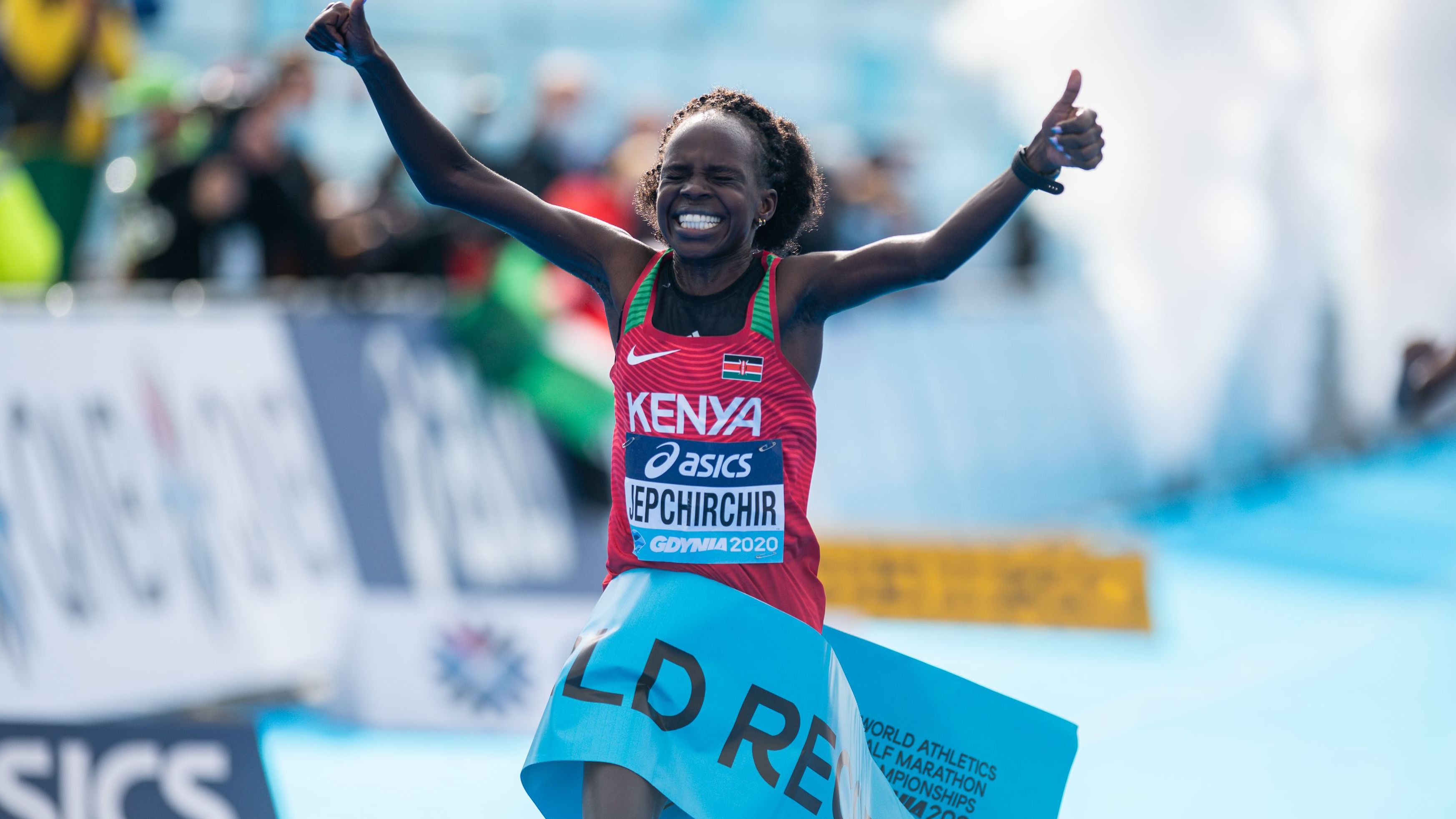 Peres Jepchirchir of Kenya celebrates after crossing the line in record time.