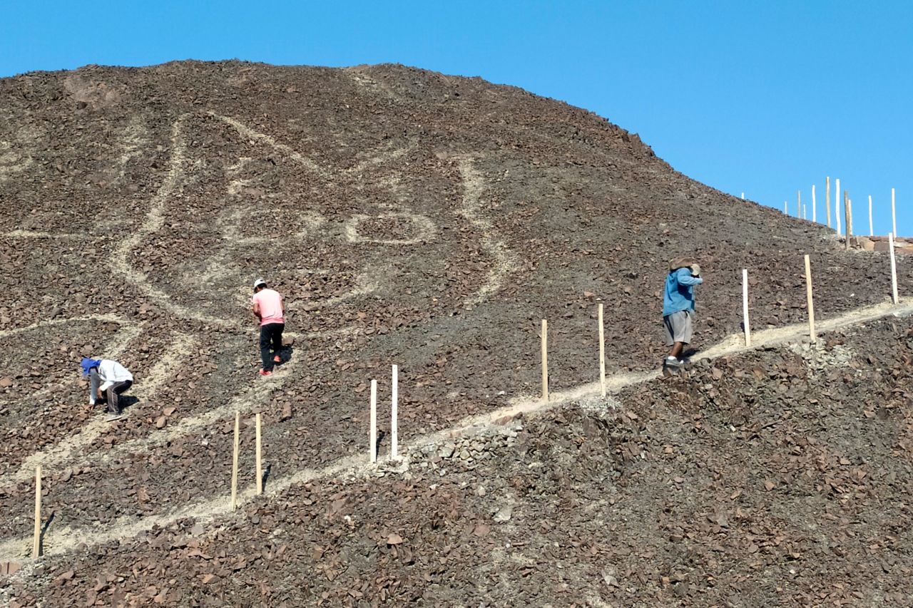 The feline figure was found on a hillside in Peru's Pampas de Jumana region.