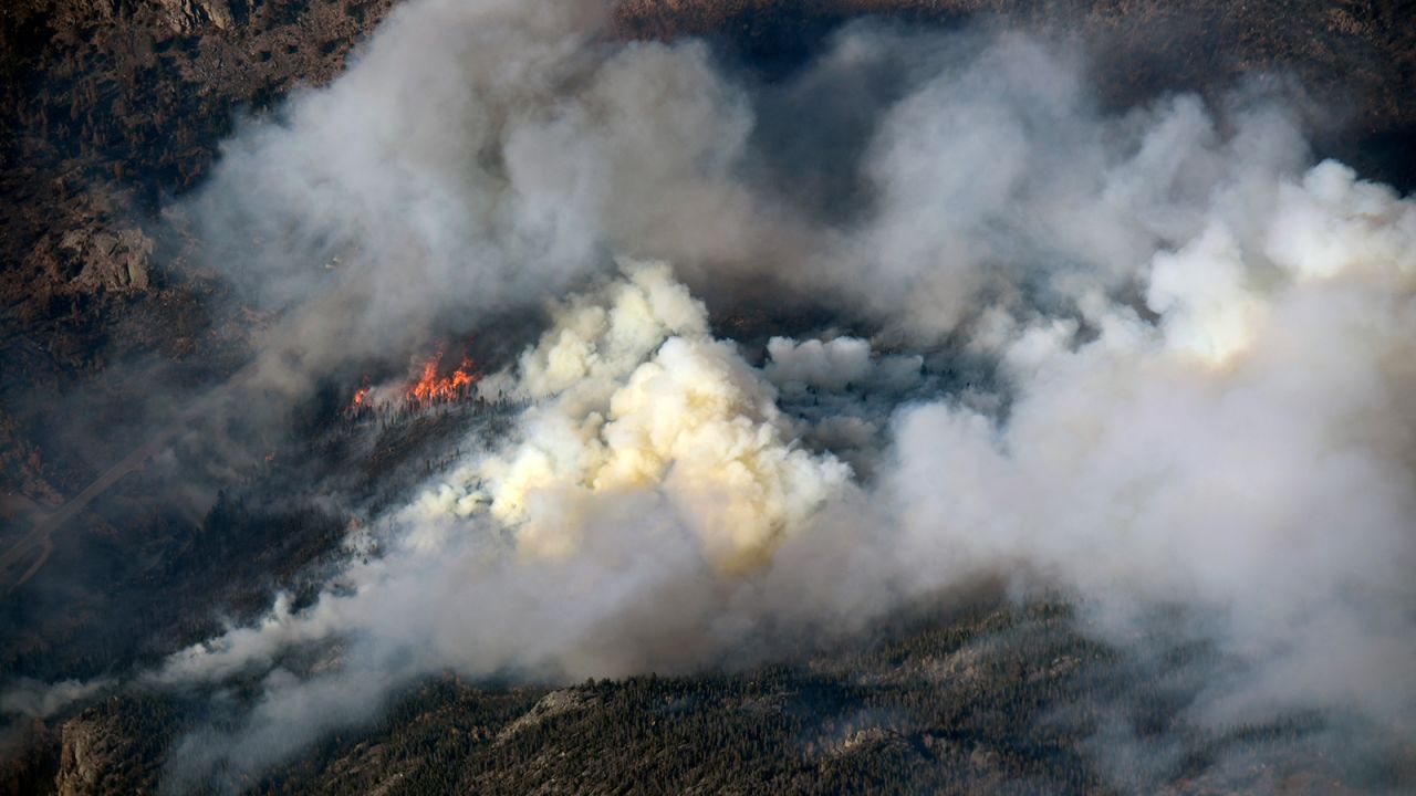 Heavy Smoke and flames rise from the Cameron Peak fire as the fire continues to burn in Larimer County.