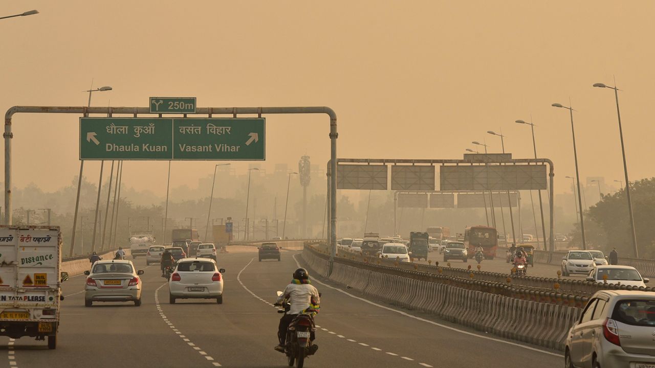 Traffic on a road in New Delhi on October 18, as the city reports high levels of air pollution.