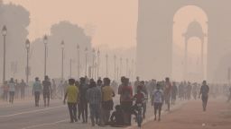 NEW DELHI, INDIA  OCTOBER 18: Visitors at a mist covered India Gate, on October 18, 2020 in New Delhi, India. (Photo by Arvind Yadav/Hindustan Times via Getty Images)