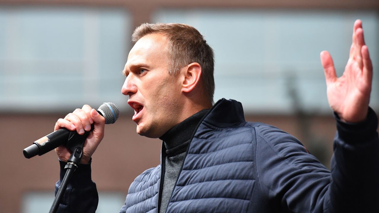 Russian opposition leader Alexei Navalny gestures as he delivers a speech during a demonstration in Moscow on September 29, 2019. - Thousands gathered in Moscow for a demonstration demanding the release of the opposition protesters prosecuted in recent months. Police estimated a turnout of 20,000 people at the Sakharov Avenue in central Moscow about half an hour after the start of the protest, which was authorised. The demonstrators chanted "let them go" and brandished placards demanding a halt to "repressions" of opposition protesters. (Photo by Yuri KADOBNOV / AFP) (Photo by YURI KADOBNOV/AFP via Getty Images)