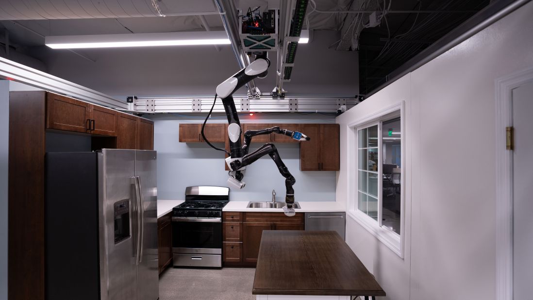 Toyota Research Institute (TRI) is developing human-assist robots in its labs in California. This "gantry robot" is adapted for the home from a style more often seen in assembly and manufacturing lines. Since these robots hang from the ceiling like a bat, they save floor space and can reach other machines and parts easily from above. This TRI robot is able to complete tasks such as loading the dishwasher. 