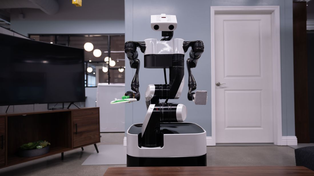 TRI says its philosophy is to develop robots which amplify human ability, instead of replacing human beings. Toyota established the institute in 2015 to research artificial intelligence (AI) with a <a href="https://money.cnn.com/2015/11/05/technology/toyota-ai-research/index.html" target="_blank">$1 billion investment</a>. It is also testing more traditional floor-based robots, like the robot helper pictured here. TRI says this robot will have the same basic capabilities as its overhanging counterpart.