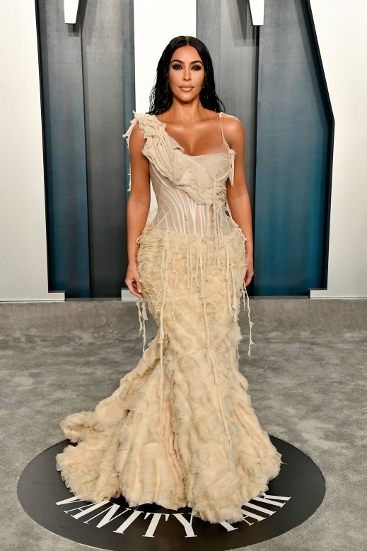 Kim Kardashian West in a vintage Alexander McQueen oyster gown at Vanity Fair's Oscars after-party earlier this year. Scroll through the gallery to see more images of her fashion through the years.