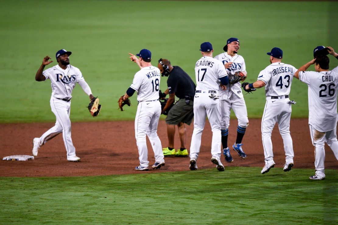 Arozarena (left) celebrates after the Rays defeated the Houston Astros.