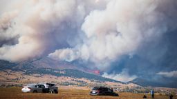 In this photo provided by Shannon Kiss, smoke from the CalWood Fire billows, Sunday, Oct. 18, 2020, as seen from Gunbarrel, Colo. (Shannon Kiss via AP)