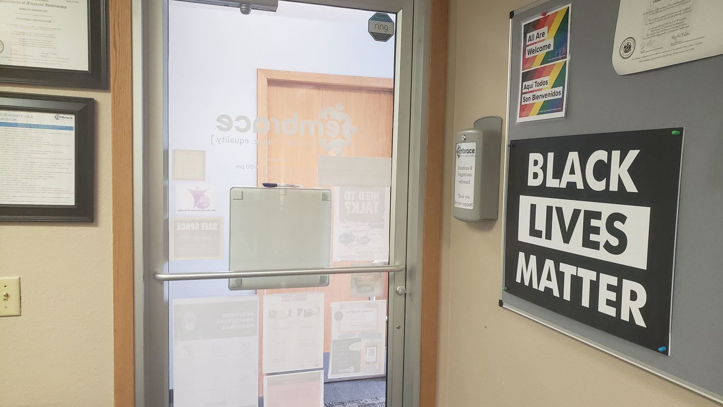 A Black Lives Matter sign is seen inside an Embrace office. More than a dozen law enforcement departments have cut ties with the organization after the signs went up.