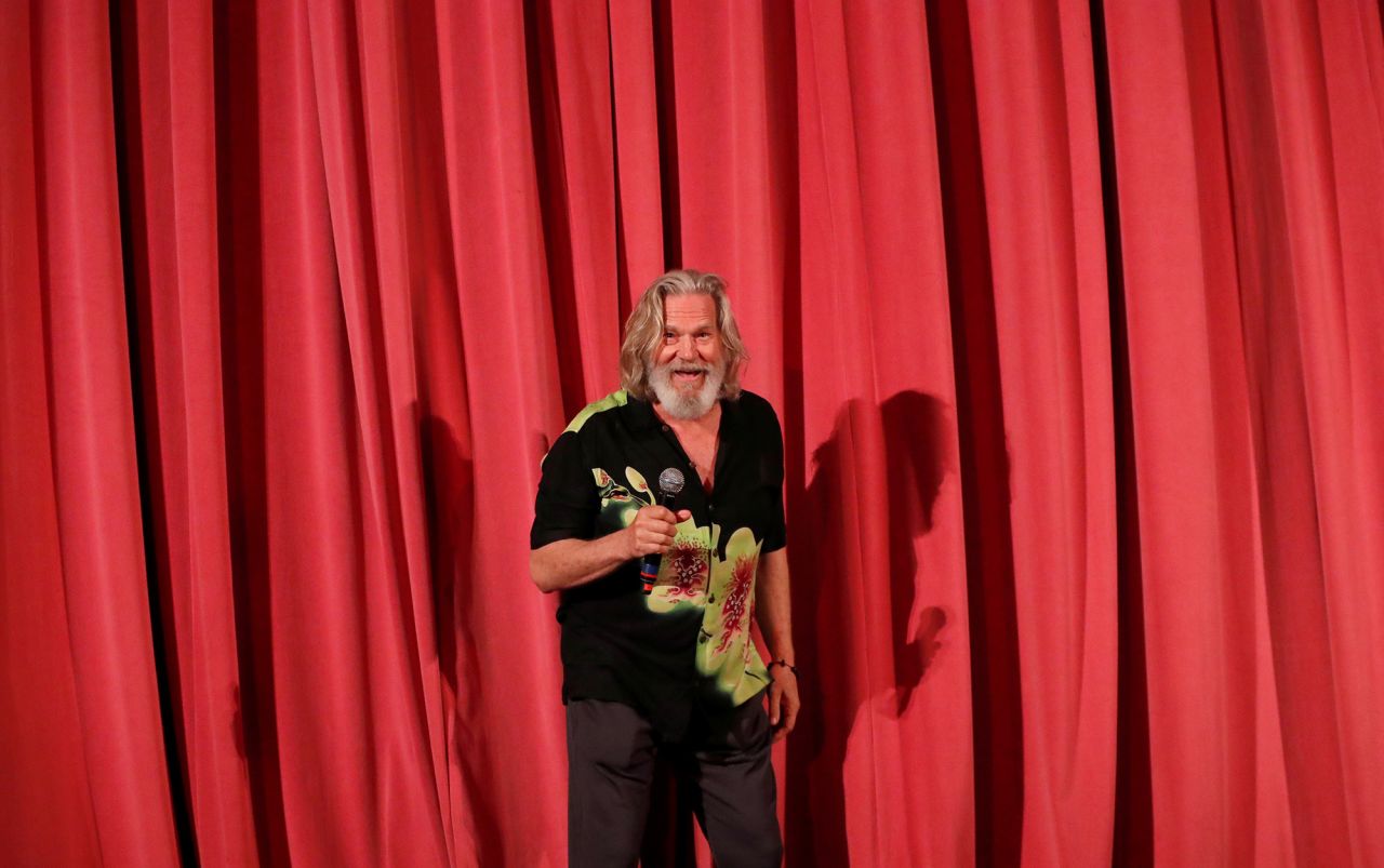 Bridges speaks on a stage during Lebowski Fest at The Wiltern Theatre in Los Angeles in April 2019. 