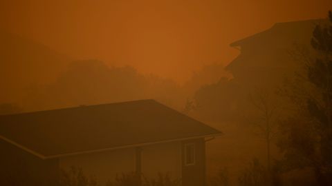 Smoke from the Cameron Peak Fire, the largest wildfire in Colorado history, fills the air in a valley near Masonville, Colorado, on October 17.
