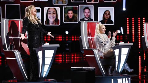 Kelly Clarkson and Gwen Stefani, joined by a virtual audience, cheer during the so-called "blind auditions" of "The Voice."
