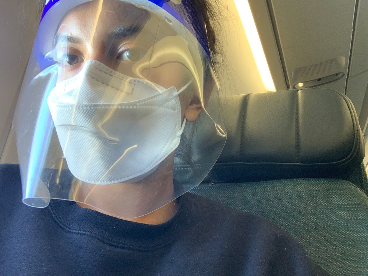 <strong>Safety first: </strong>Flying on Cathay Pacific, Tsui and all other passengers were required to socially distance and wear masks.