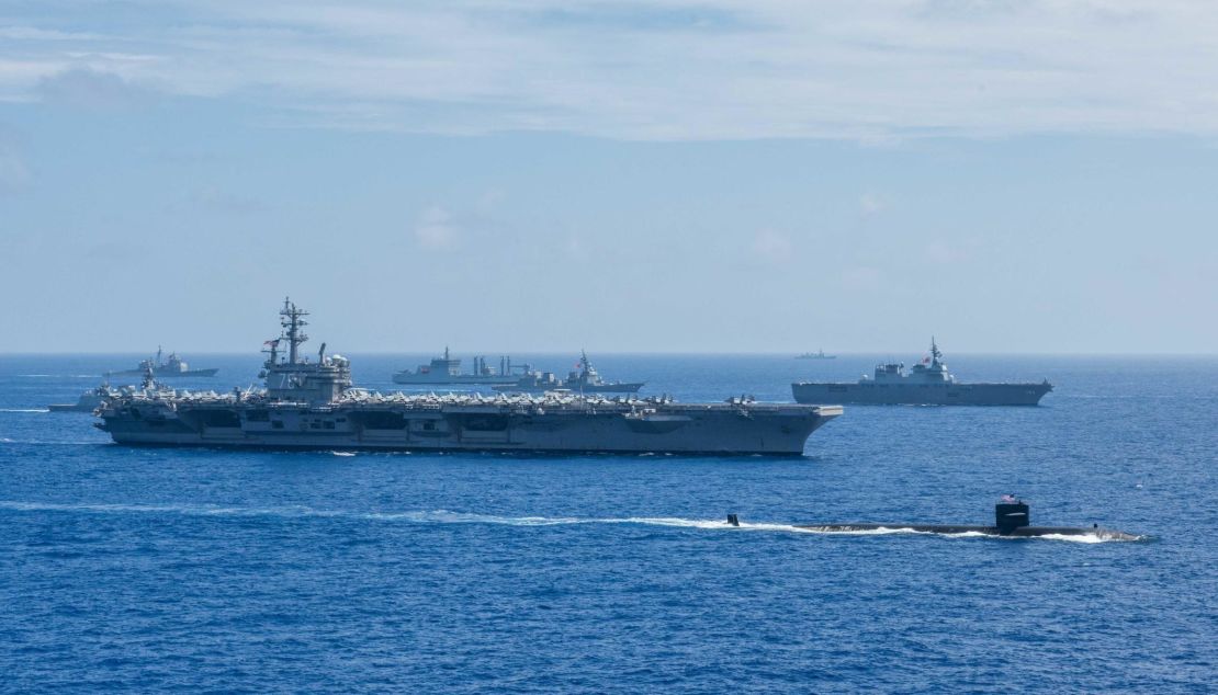 Ships from the Indian Navy, Japan Maritime Self-Defense Force (JMSDF) and the US Navy sail in formation during Malabar 2018. 